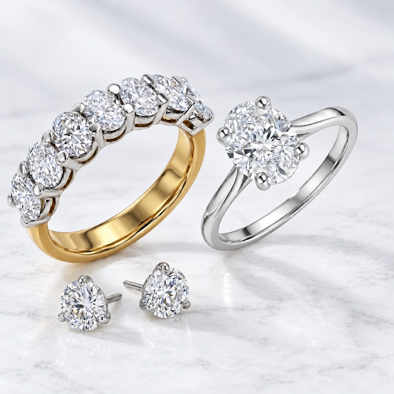 Lab-grown diamond oval solitaire ring, eternity ring and stud earrings