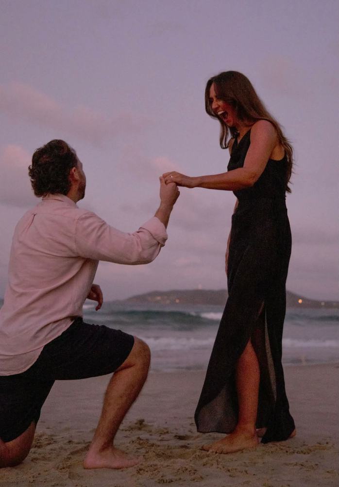 Jordan proposing to Sophie by the sea