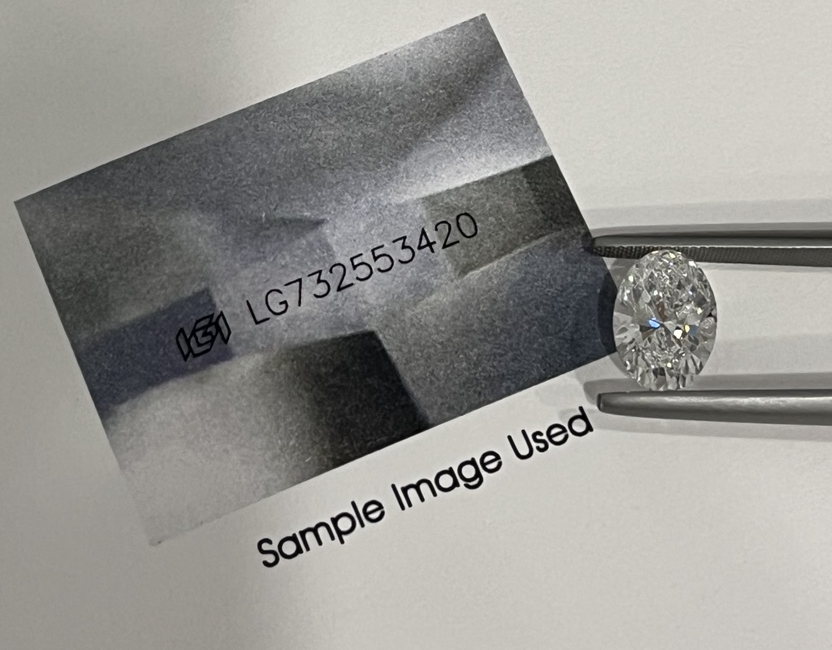 Loose oval lab-grown diamond beside a magnified image of IGI laser inscription LG732553420