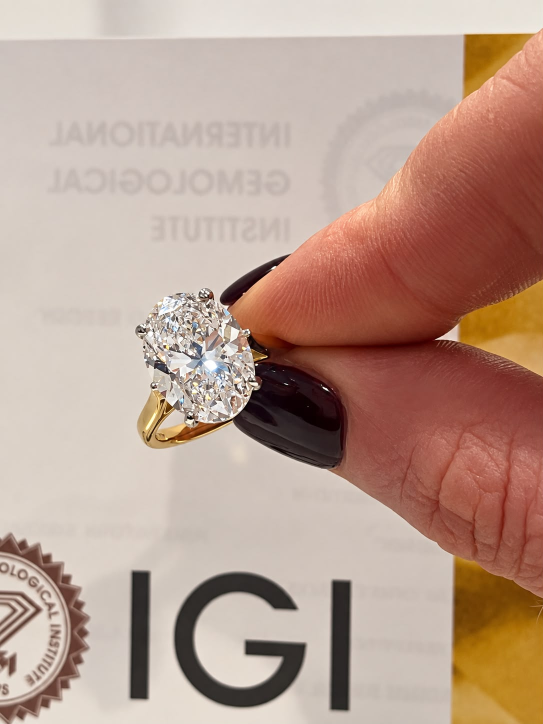 6.08ct lab-grown oval brilliant solitaire engagement ring in 18ct yellow and white gold