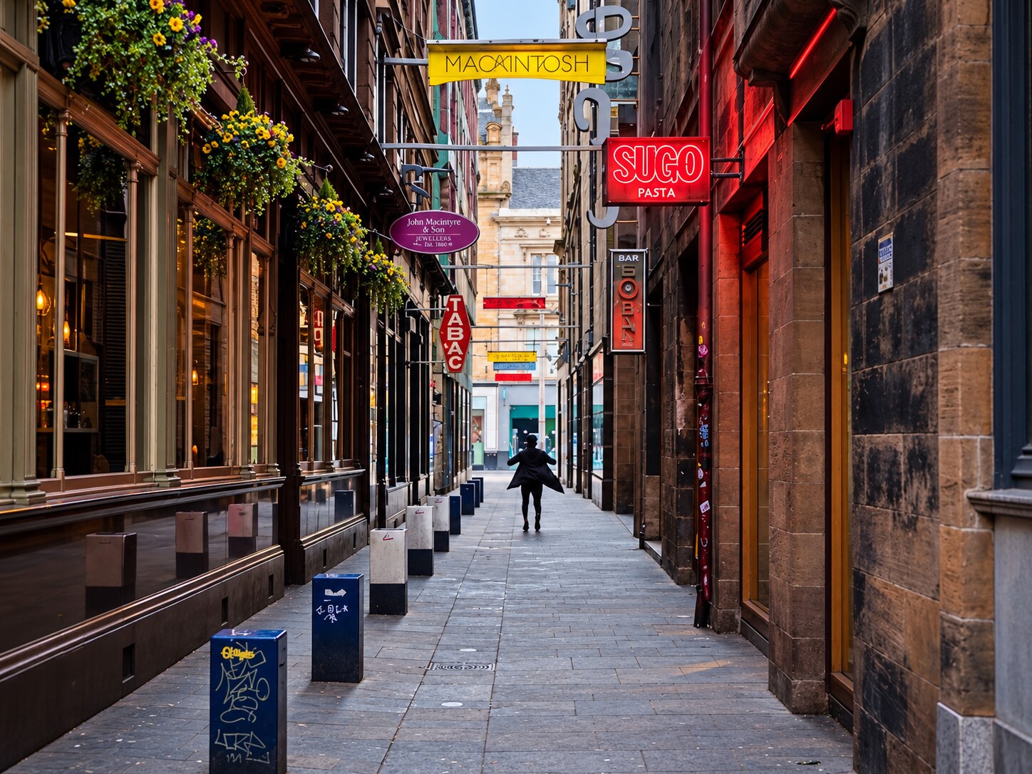 Mitchell Lane in Glasgow city centre, showing the John Macintyre & Son showroom sign.