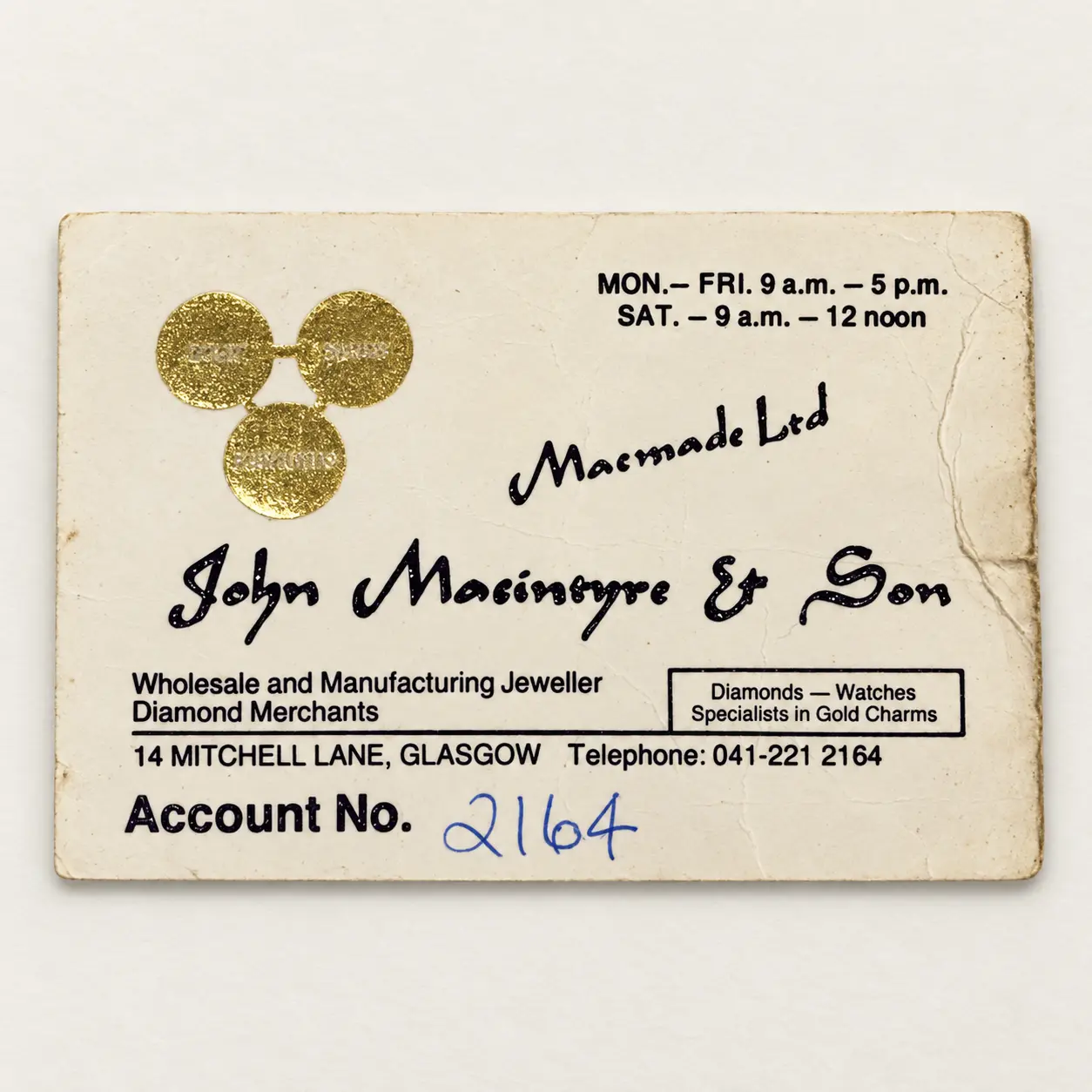 Early John Macintyre and Son customer account card with Mitchell Lane address and opening hours.