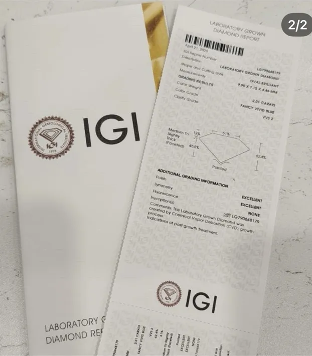 IGI report for the 2.01ct Fancy Vivid Blue oval lab-grown diamond.